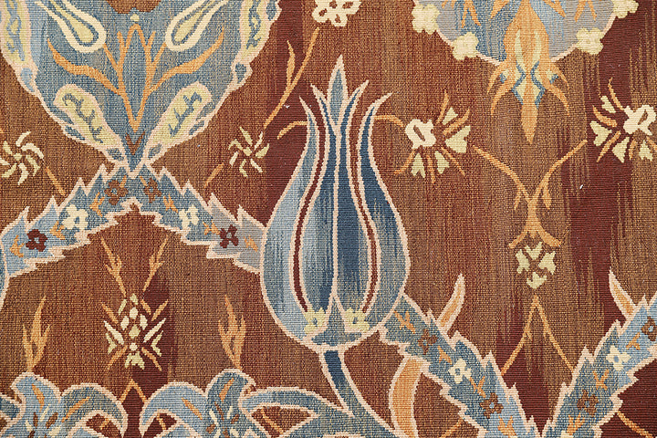 Large handwoven wool kilim in brown, blue, and ivory with Ottoman design. Luxury 12×18 flatweave rug from the Ariana Kilim Collection.