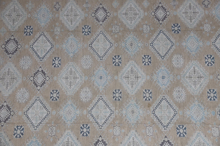 16'4" x 13'2" Large hand-knotted wool Ariana Hazara rug with Caucasian geometric motifs in tan, beige, gold, blue, black, and white.