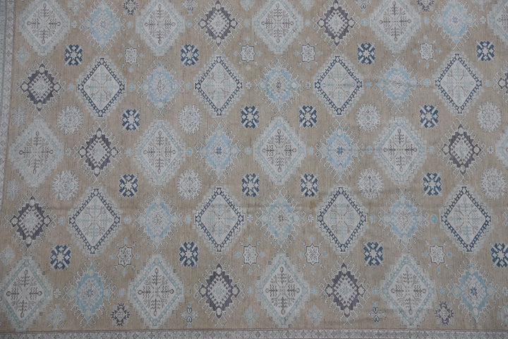16'4" x 13'2" Large hand-knotted wool Ariana Hazara rug with Caucasian geometric motifs in tan, beige, gold, blue, black, and white.