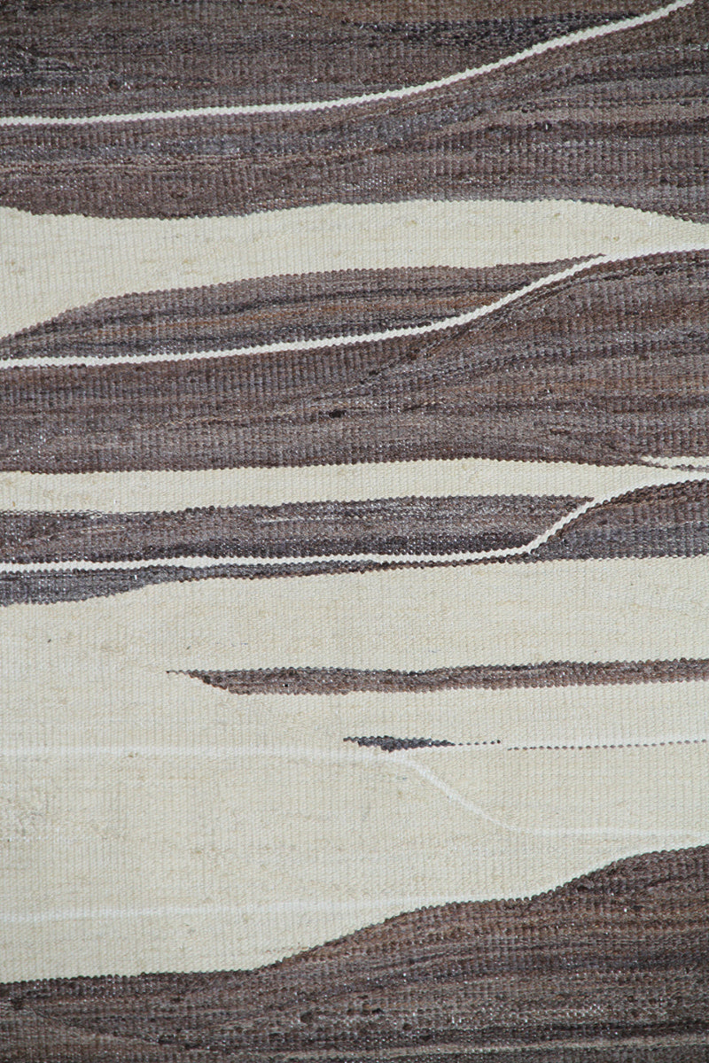 Textured fabric with brown and beige pattern
