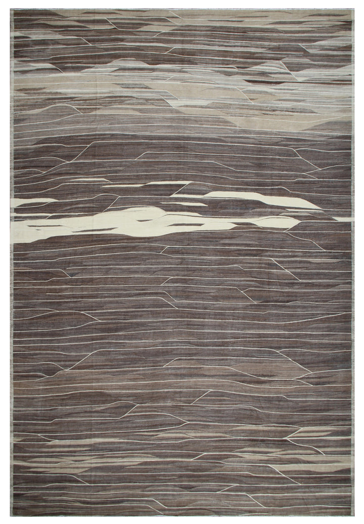 A rectangular rug with a brown and ivory color pattern, featuring a traditional kilim weave.