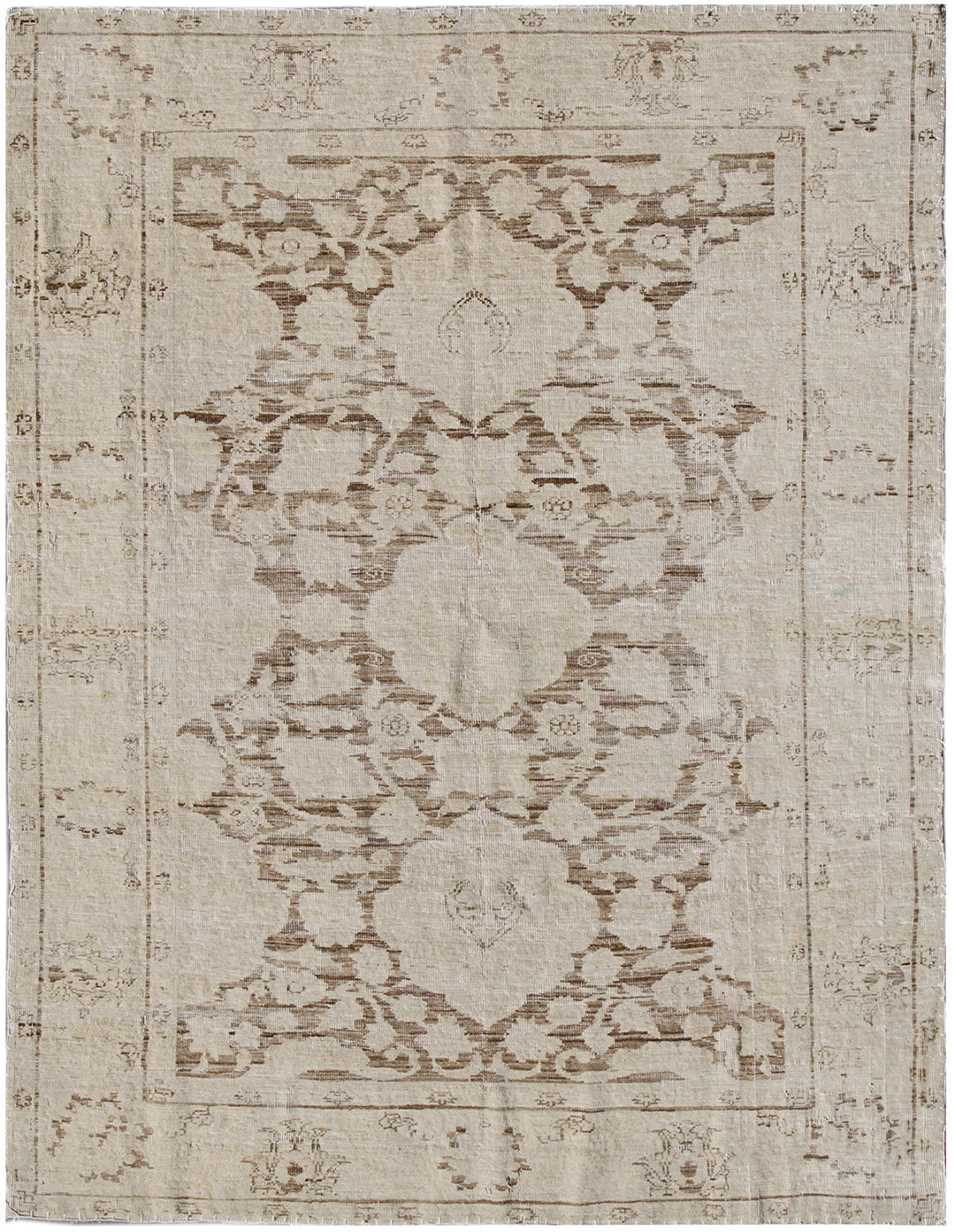 A pale brown and beige hand-knotted rug with an intricate geometric Agra design, from the Ariana Vintage Collection.