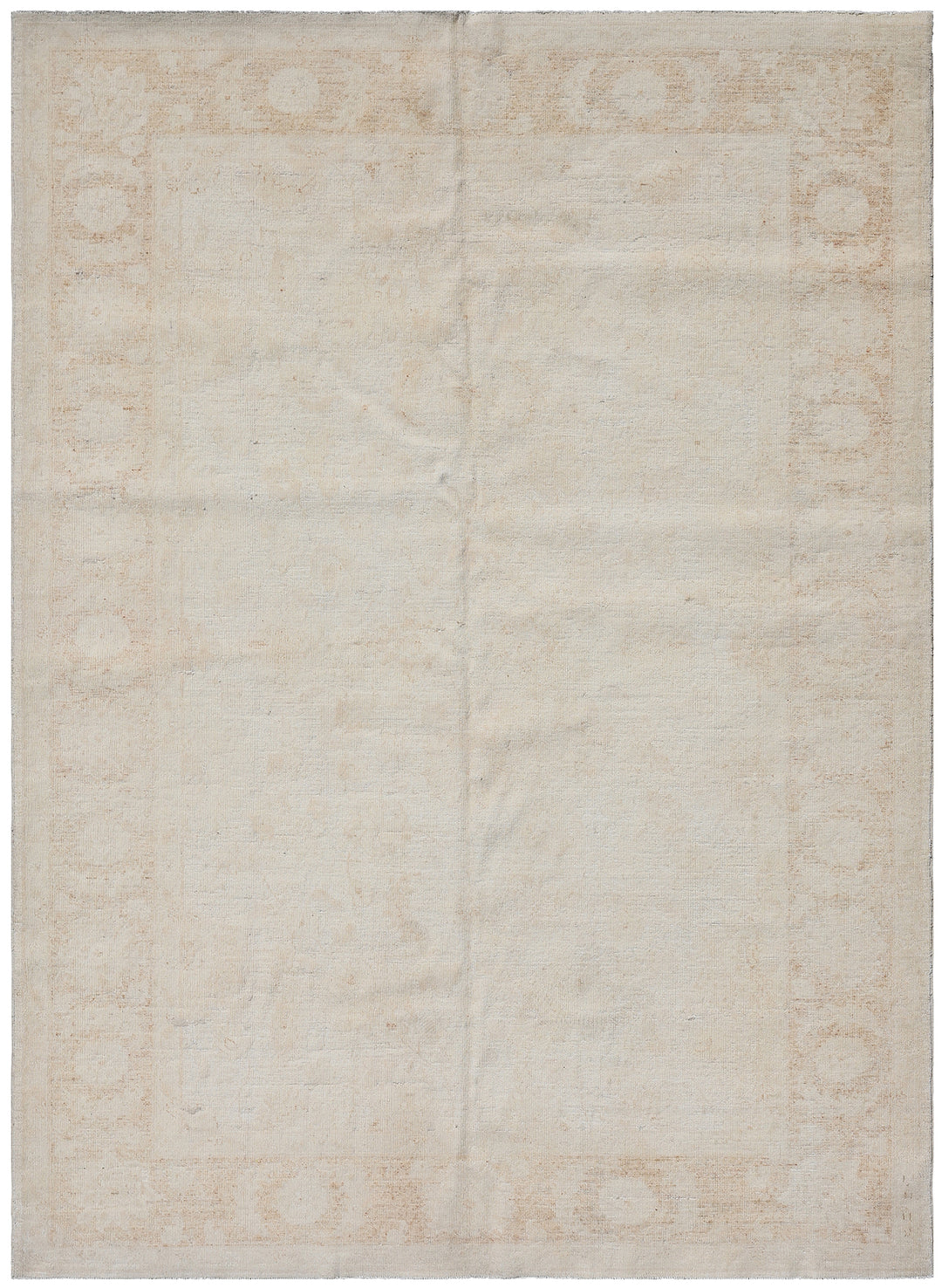 A beige Ariana Vintage Collection rug with a floral pattern in a pale washed out color.