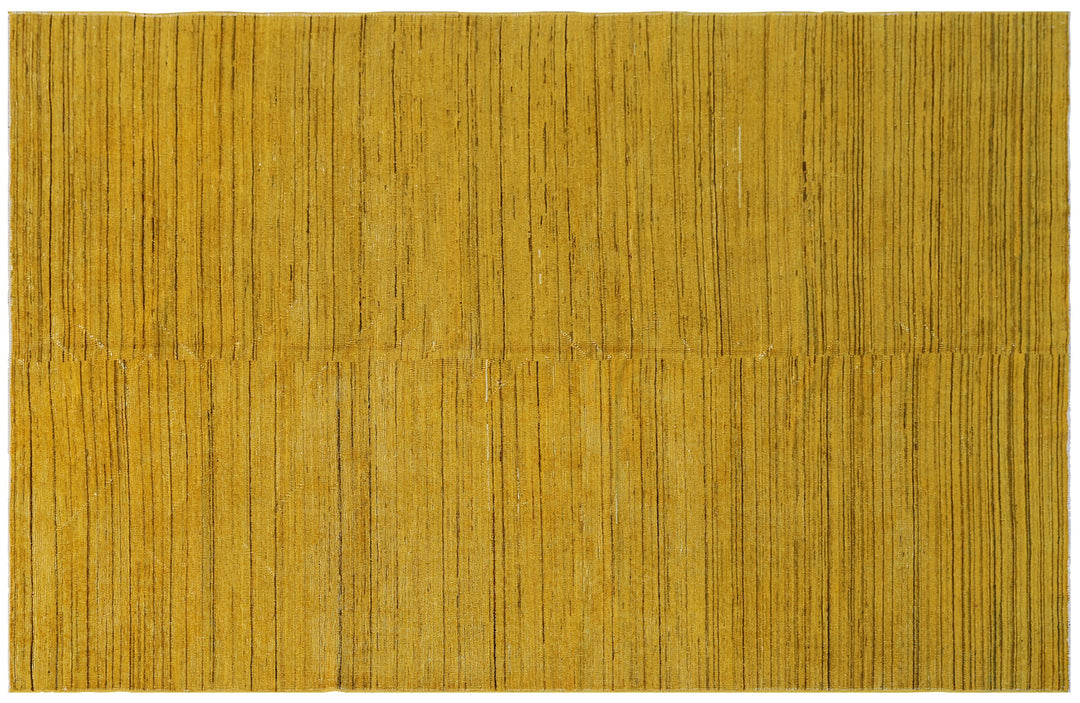 Hand-knotted wool Ariana Over-dye rug with a Mustard Gold and Brown Stria textured design, measuring 8’8” x 5’7”.