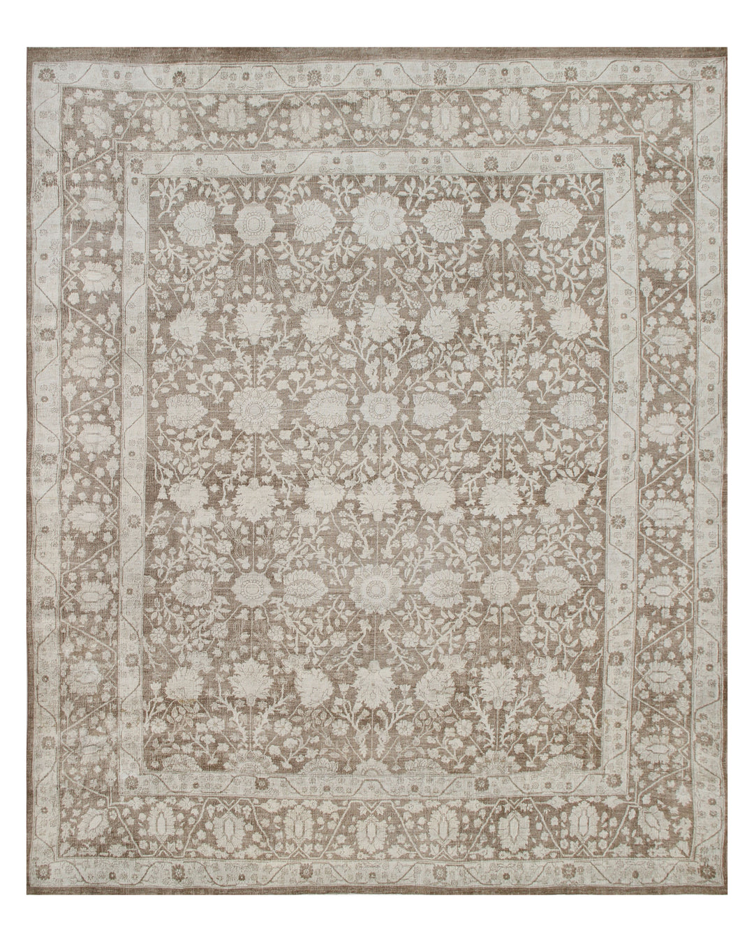 A soft brown kaki Persian Tabriz design rug with intricate geometric patterns.