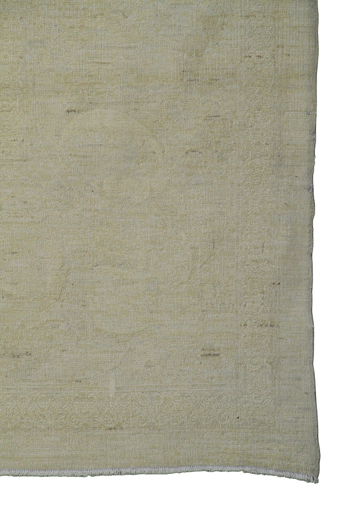 Textured beige fabric on a white background