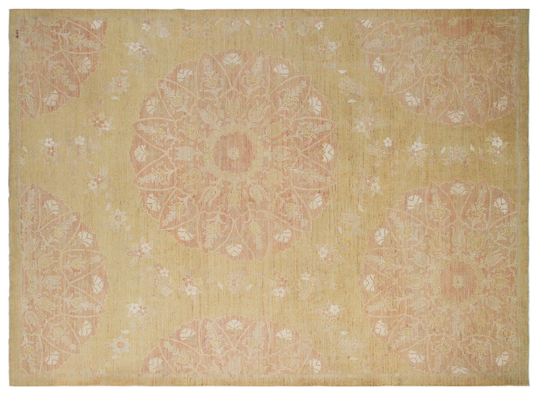 Top-down view of a light pink and honey gold Ariana rug with large Ottoman floral palmettes.