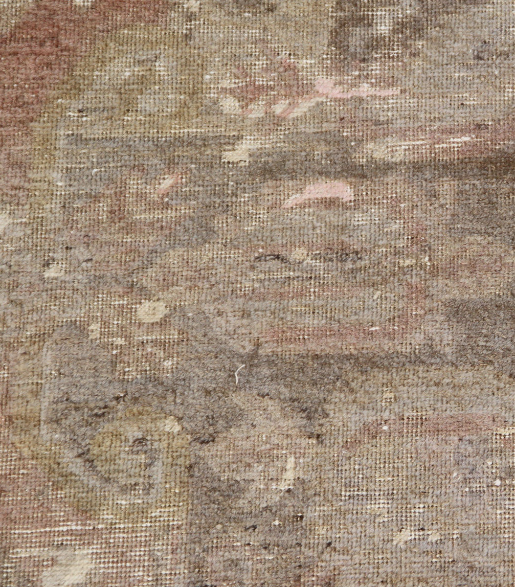 4x8 antique Samarkand hand-knotted wool area rug featuring faded floral motifs in muted tones by Ariana Rugs.