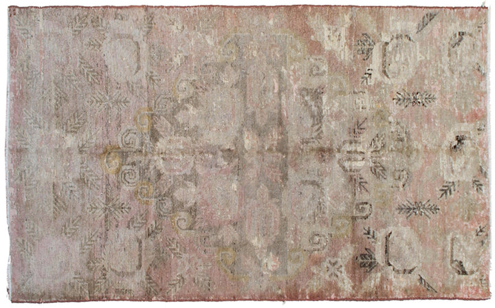 4x8 antique Samarkand hand-knotted wool area rug featuring faded floral motifs in muted tones by Ariana Rugs.