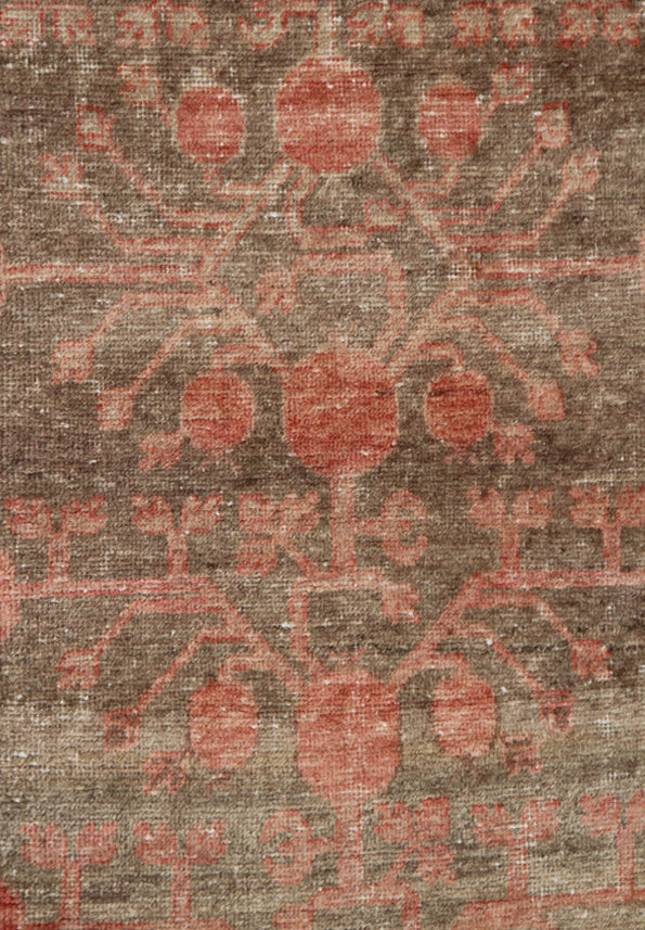 Extra-large antique East Turkistan Samarkand wool rug measuring 7'11" x 16'1" featuring a pomegranate botanical design in grey, pink, brown, beige, and black.