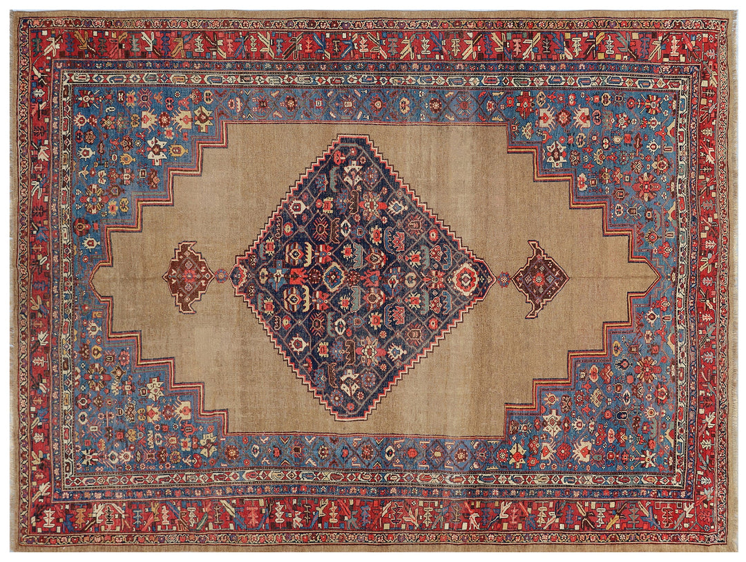 An antique wool camel hair rug with blue and red geometric medallions and a beige border.
