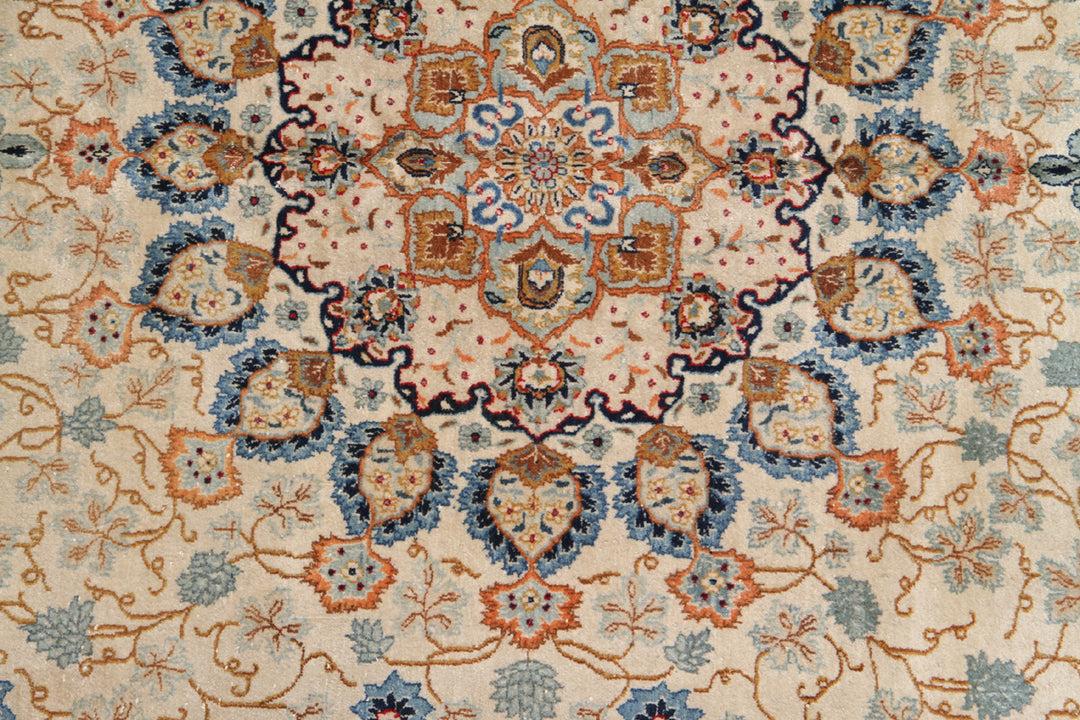 Image Alt Text: Antique semi-antique Kerman wool rug in blue and ivory with European floral design