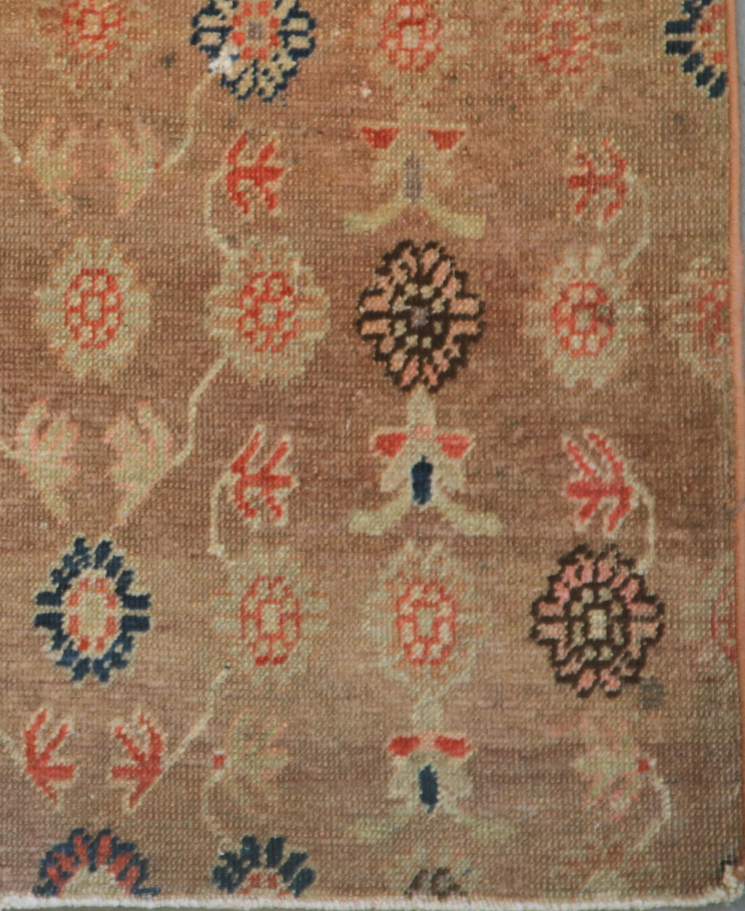 Distressed 4x7 antique Samarkand hand-knotted wool area rug featuring a peach terracotta background with visible historic wear by Ariana Rugs.
