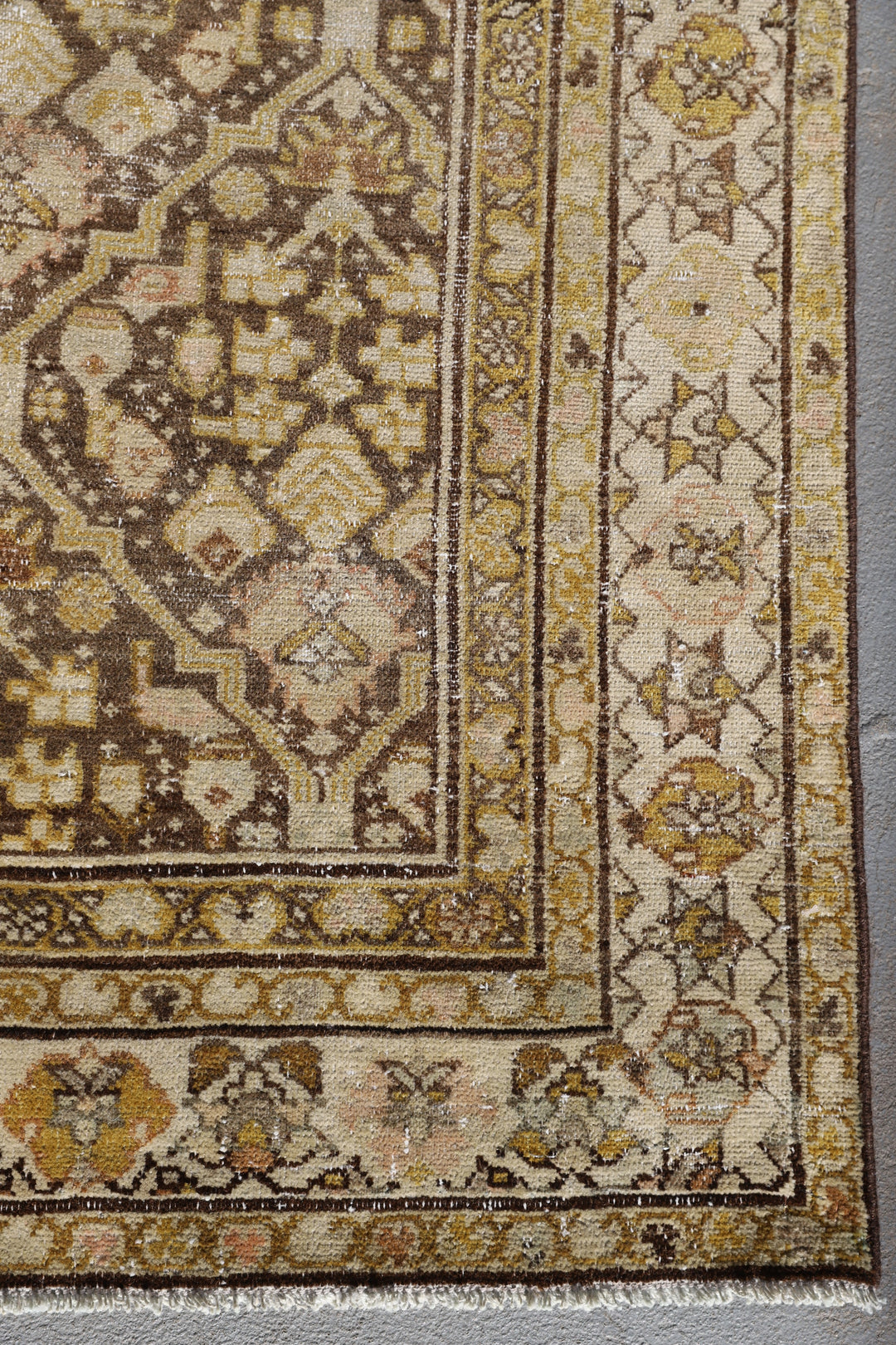 5x10 antique Persian Malayer wide runner rug featuring distressed vintage patina in soft brown and beige geometric patterns