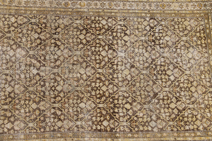5x10 antique Persian Malayer wide runner rug featuring distressed vintage patina in soft brown and beige geometric patterns