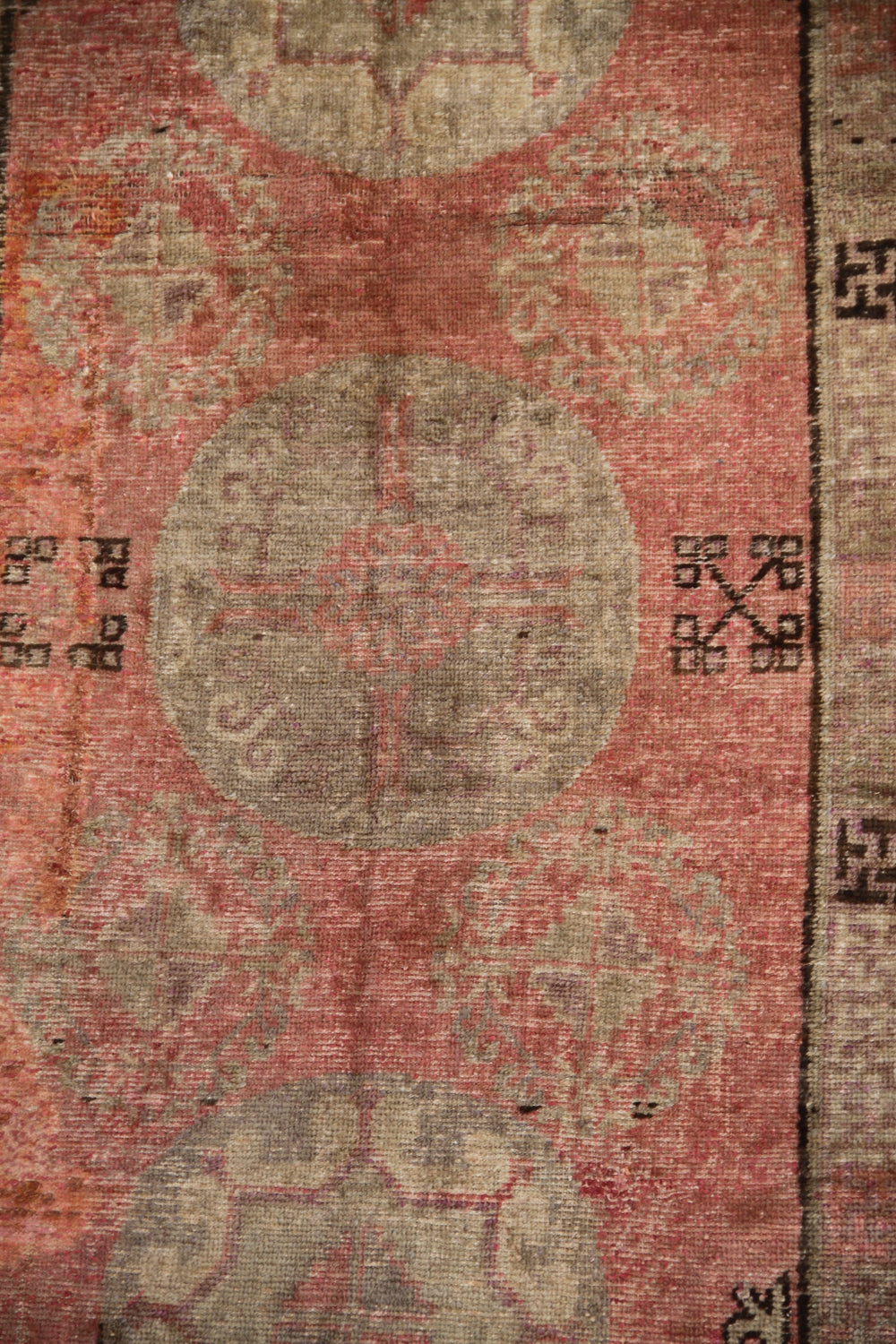 Rare 4x8 antique Samarkand hand-knotted wool area rug featuring three central motifs on a gentle pink and beige field by Ariana Rugs.