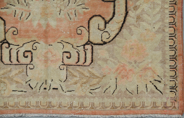 Antique Samarkand Yarkand hand-knotted wool rug measuring 9'1" x 5'5" featuring a French floral design in orange, pink, ivory, brown, and green tones.