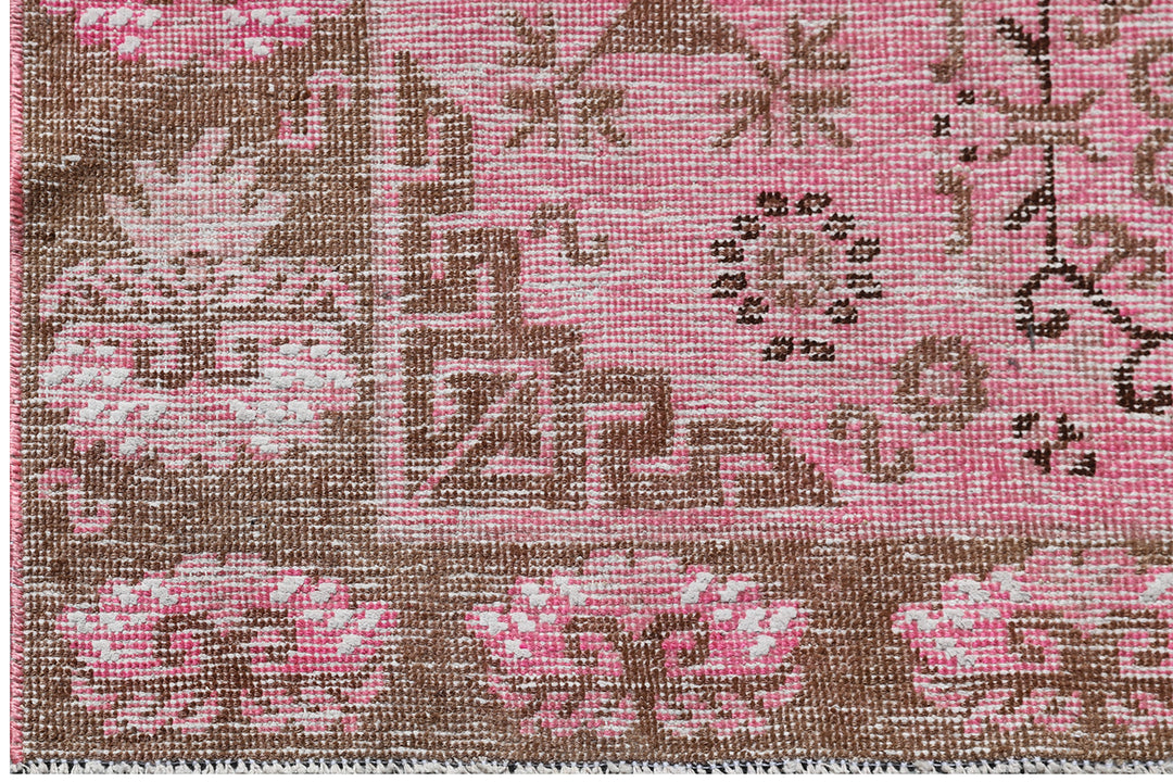 Antique Samarkand wool runner measuring 3'10" x 7'10" featuring an allover design in hot pink and brown tones.