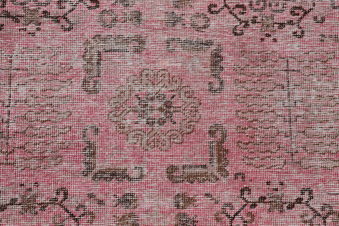 Antique Samarkand wool runner measuring 3'10" x 7'10" featuring an allover design in hot pink and brown tones.
