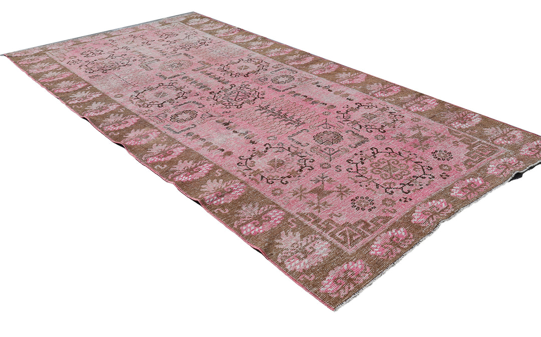 Antique Samarkand wool runner measuring 3'10" x 7'10" featuring an allover design in hot pink and brown tones.