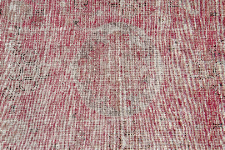 Antique Samarkand wool rug measuring 10'10" x 5'7" featuring a pink and cream color palette with classic medallion designs.
