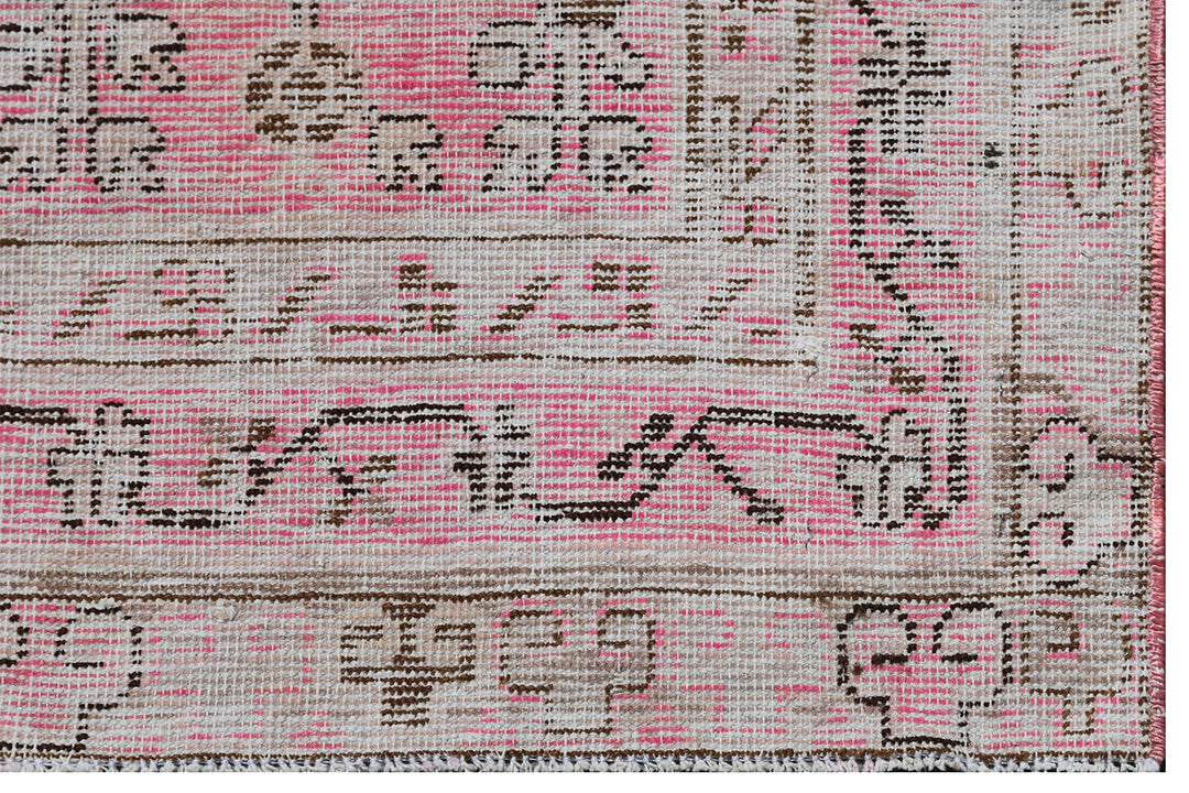 Antique Samarkand Khotan wool rug measuring 5'2" x 4'0" featuring a delicate pink floral design and vintage patina.