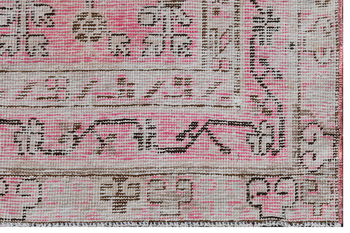 Antique Samarkand Khotan wool rug measuring 5'2" x 4'0" featuring a delicate pink floral design and vintage patina.