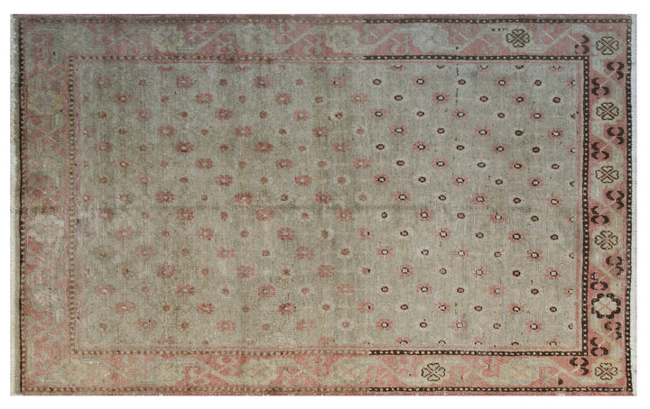 Rare 4x7 antique Samarkand hand-knotted wool rug featuring pink terracotta flowers on a soft green background by Ariana Rugs.