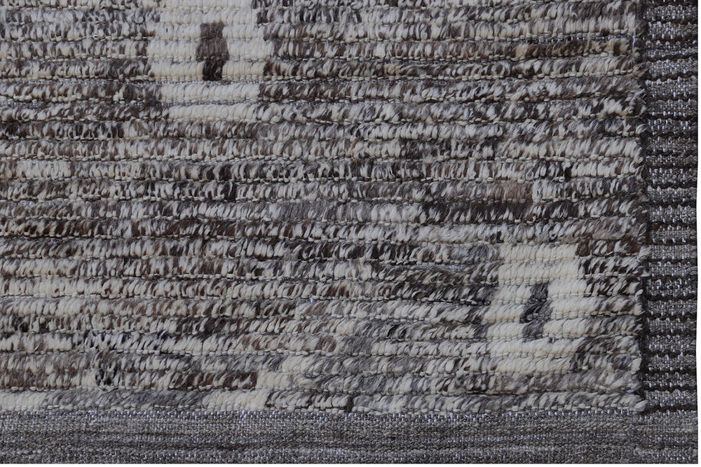 Ariana Barchi 9x11 hand-knotted grey and brown wool rug featuring an authentic Moroccan style design