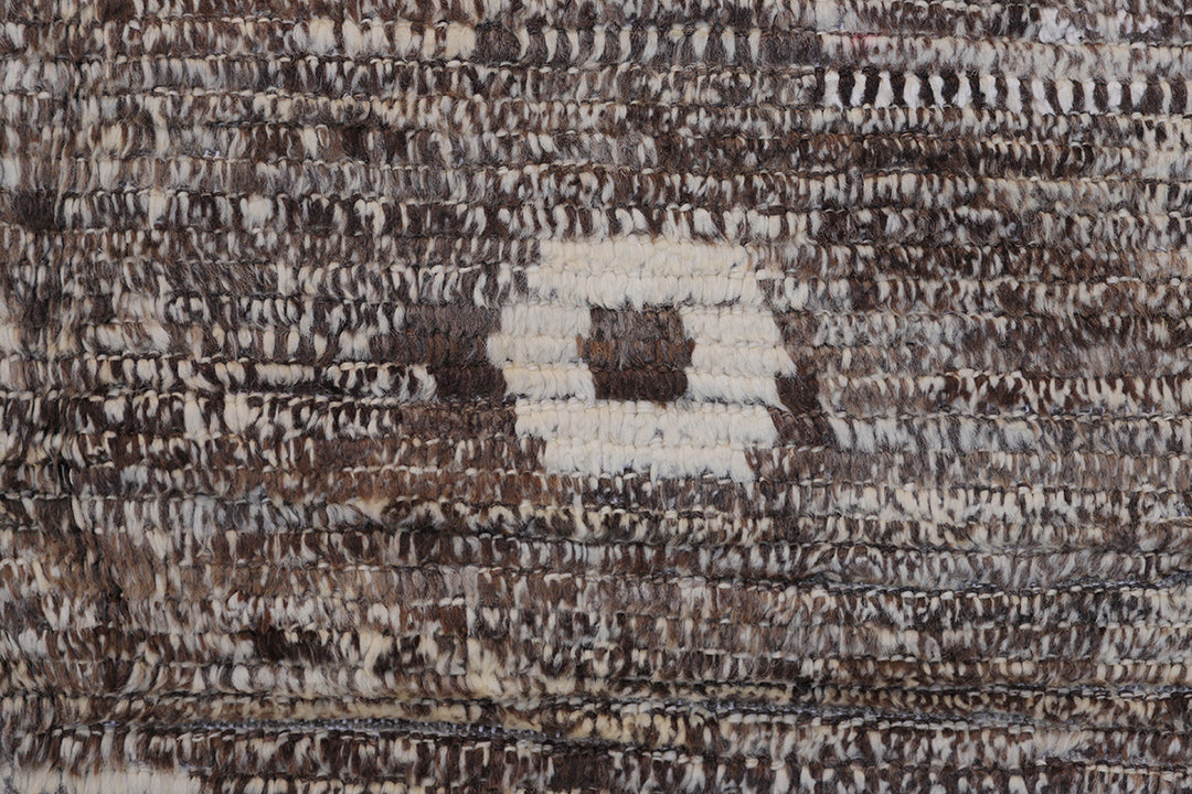 Ariana Barchi 9x11 hand-knotted grey and brown wool rug featuring an authentic Moroccan style design