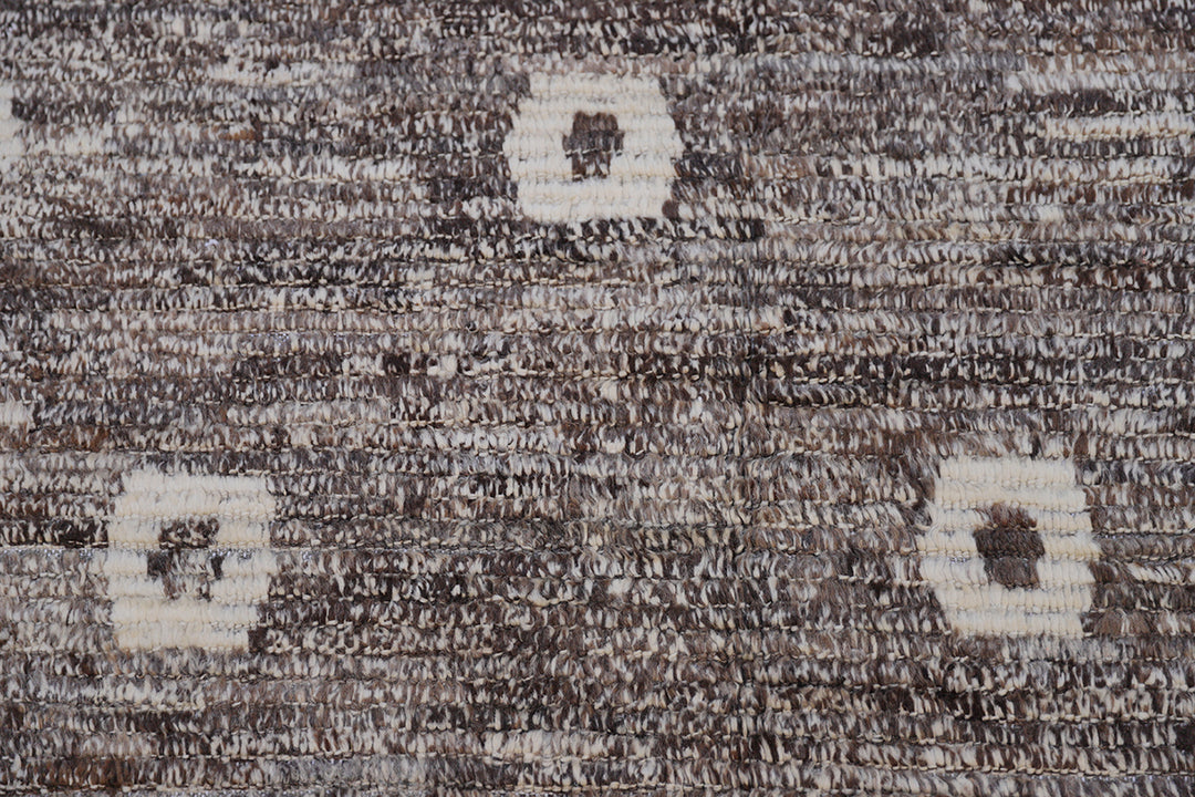Ariana Barchi 9x11 hand-knotted grey and brown wool rug featuring an authentic Moroccan style design