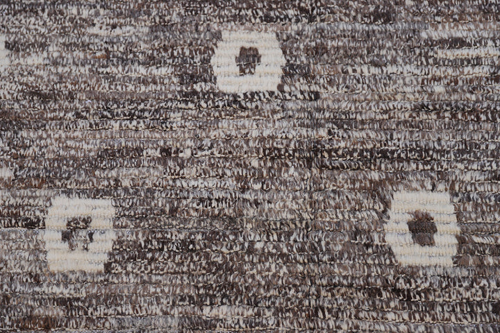 Ariana Barchi 9x11 hand-knotted grey and brown wool rug featuring an authentic Moroccan style design