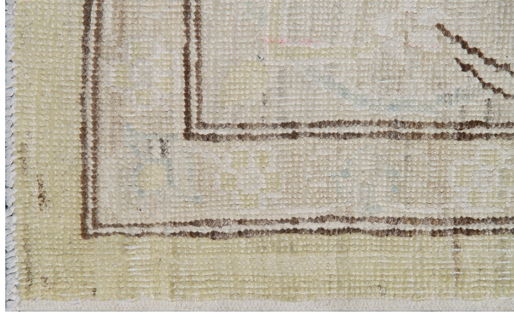 Authentic Ariana Traditional Collection 6x9 area rug featuring a fine luxury Polonaise floral design in a soft yellow, ivory, and brown color palette with woven silk highlights, hand-knotted in Afghanistan.