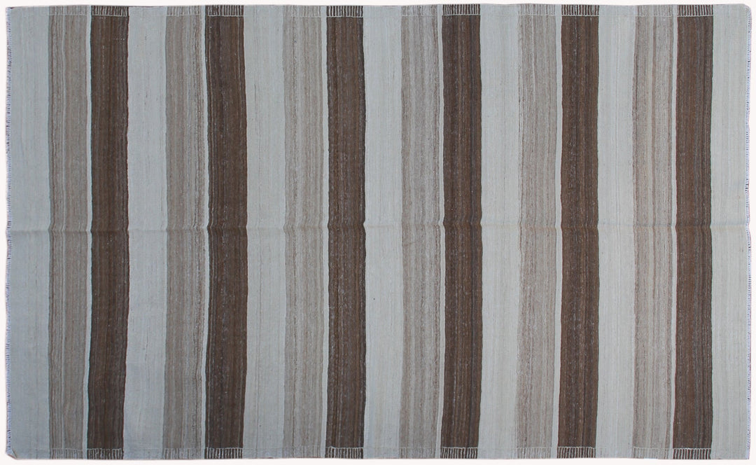 6x10 Ariana Kilim hand-woven Afghan wool rug with earth tone cream and brown stripes, full overhead view.