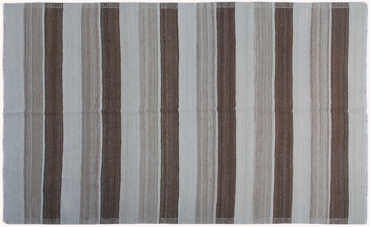 6x10 Ariana Kilim hand-woven Afghan wool rug with earth tone cream and brown stripes, full overhead view.