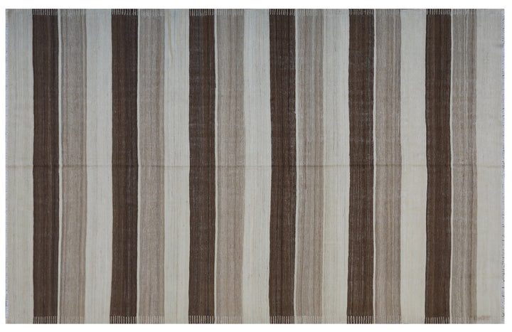 6x9 Ariana Kilim hand-woven Afghan wool rug with brown, beige, and cream stripes, full overhead view.