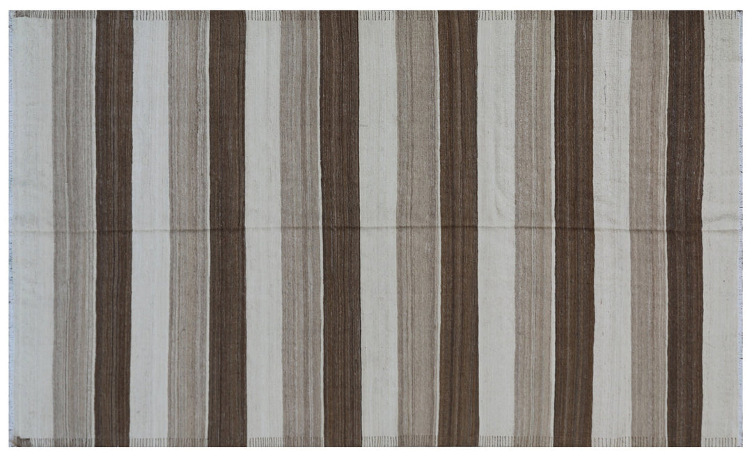Close-up of organic hand-spun wool weave showing wide ivory and brown striped detail on Afghan kilim by Hazara weavers.