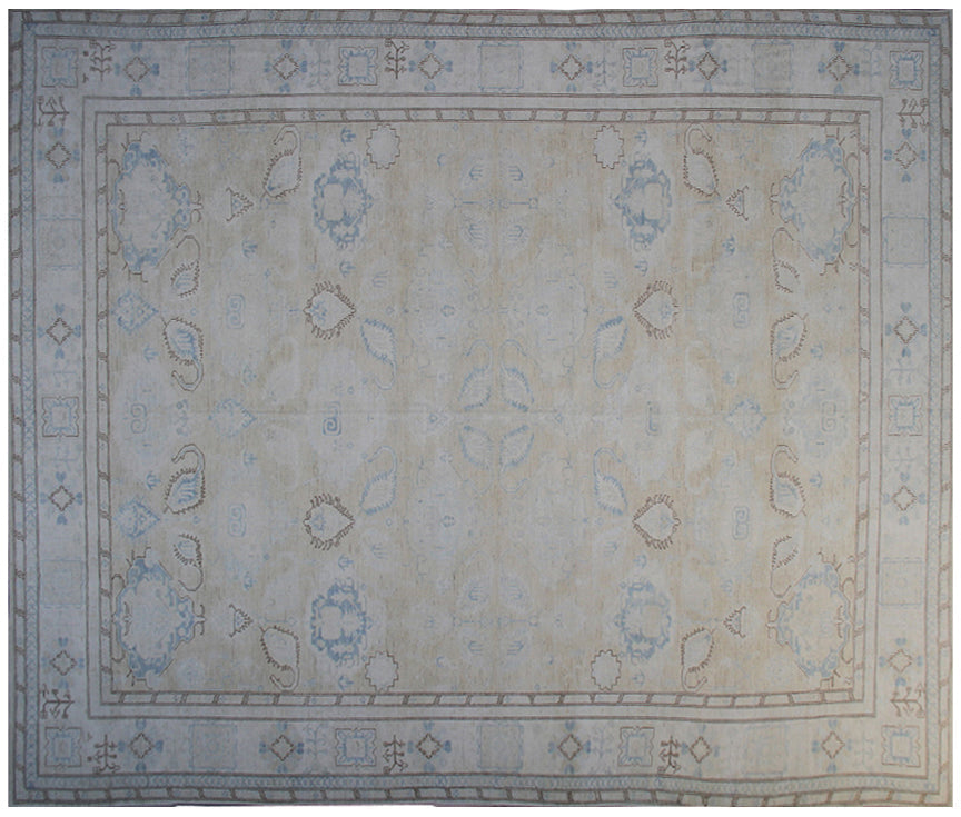 Ariana large Caucasian design wool rug in ivory and pale blue, hand-knotted in Afghanistan by Hazara artisans. Luxury oversized geometric area rug for elegant interiors.