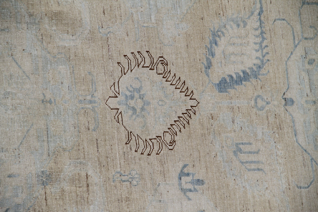 Ariana large Caucasian design wool rug in ivory and pale blue, hand-knotted in Afghanistan by Hazara artisans. Luxury oversized geometric area rug for elegant interiors.