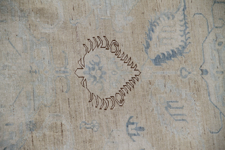 Ariana large Caucasian design wool rug in ivory and pale blue, hand-knotted in Afghanistan by Hazara artisans. Luxury oversized geometric area rug for elegant interiors.