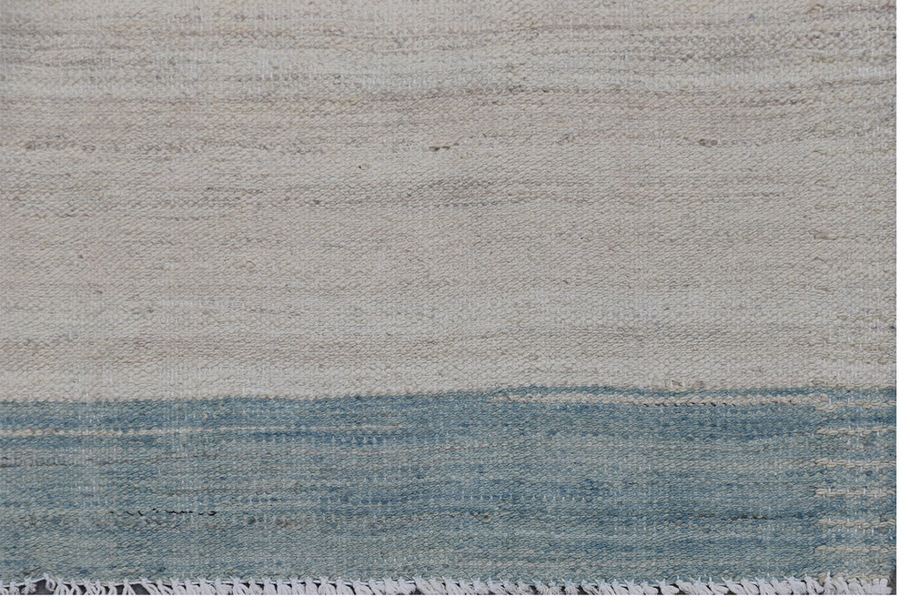 Ariana Rugs 6'x10' fine handwoven blue, ivory, and cream striped wool kilim area rug crafted in Afghanistan on a cotton foundation.