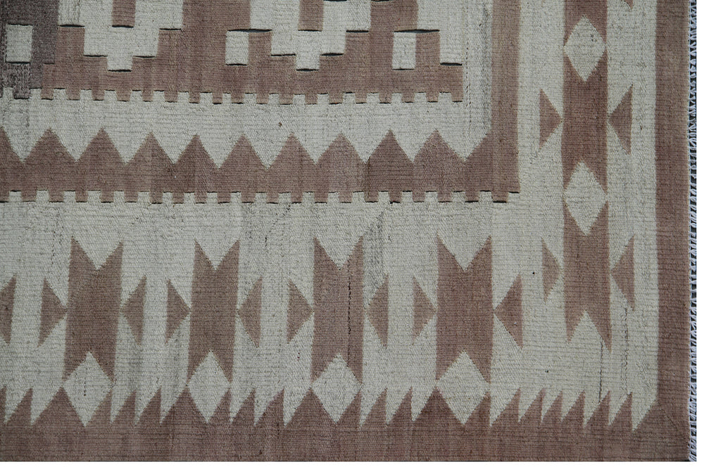Ariana Rugs 8'x9' handwoven earth tone brown and tan Maimana style wool kilim area rug featuring a classic geometric pattern on a cotton foundation.