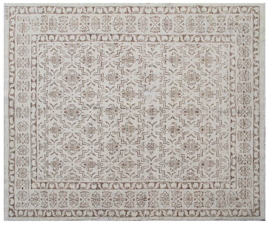 Ariana Samarkand collection 5'x4' hand-knotted wool area rug in beige and brown featuring a geometric design