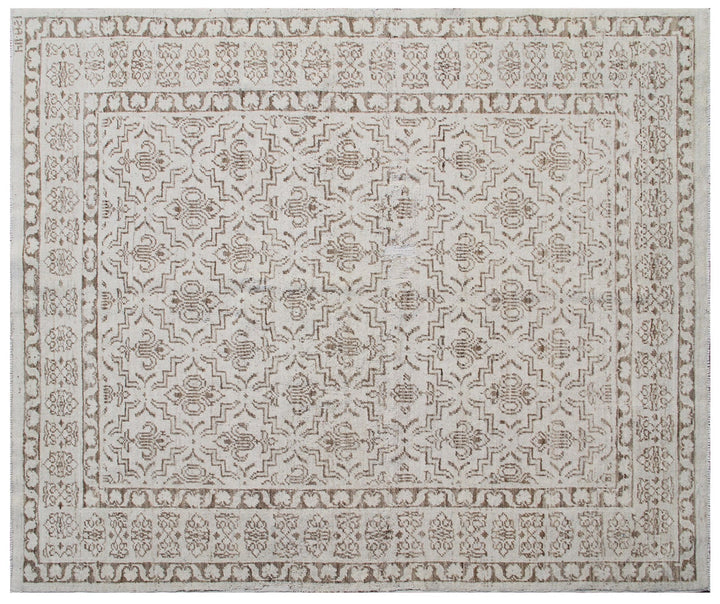 Ariana Samarkand collection 5'x4' hand-knotted wool area rug in beige and brown featuring a geometric design
