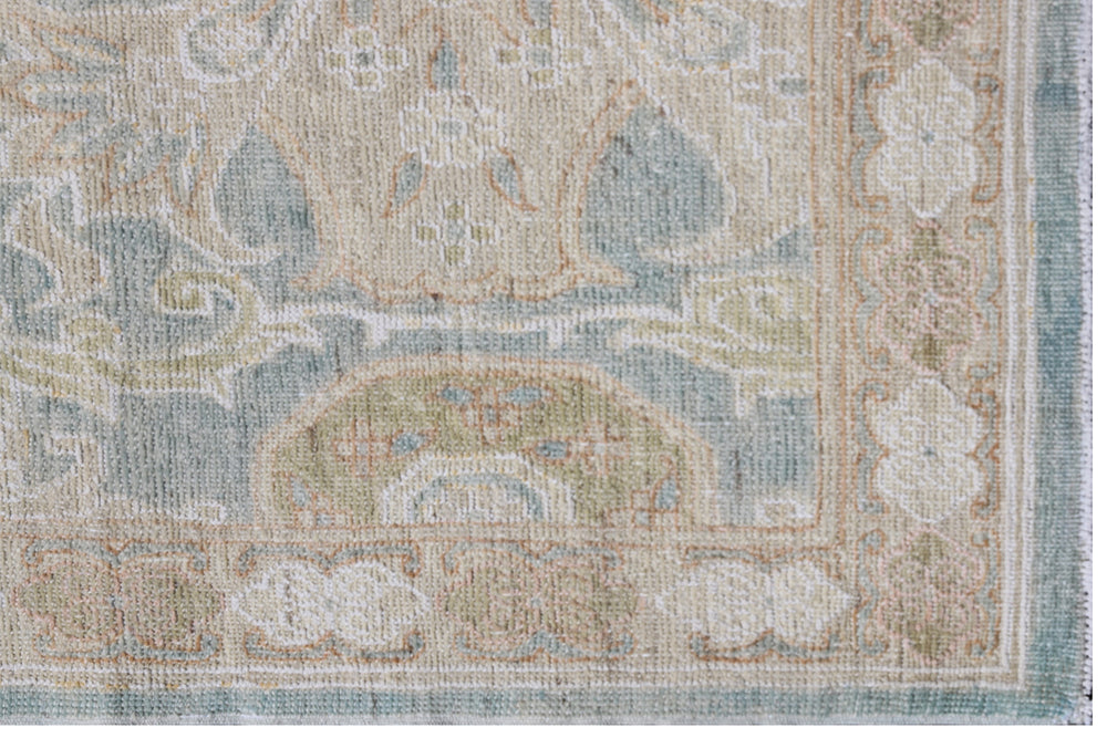 Fine hand-knotted Ariana traditional Agra design wool runner rug with classic floral scrollwork in soft blue, beige, and cream