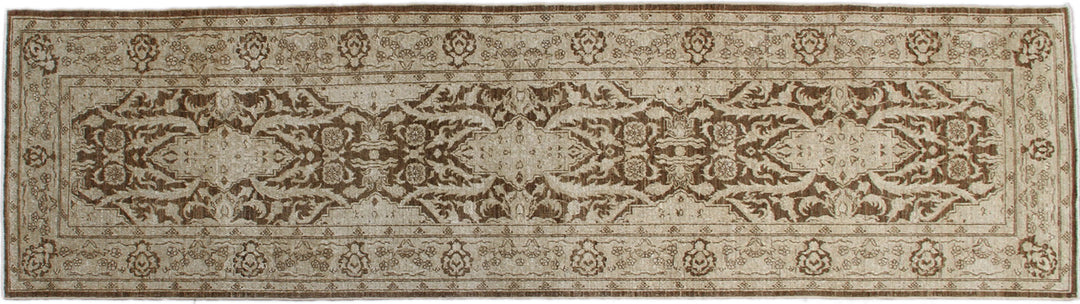 A rectangular traditional Tabriz design rug with brown ivory coloring and intricate geometric patterns.