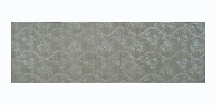Over-the-shoulder view of an authentic 8'9" x 3'0" Ariana transitional hand-knotted runner rug featuring an intricate Chinoiserie design with luminous silk highlights.