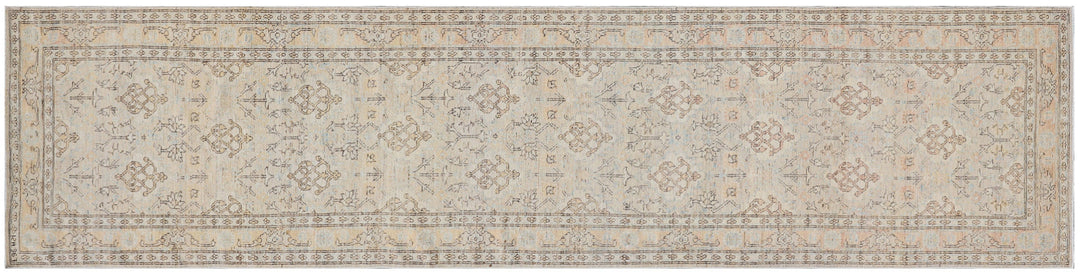 Fine hand-knotted Ariana transitional European design wool runner rug in rich camel, blue, brown, and terracotta tones
