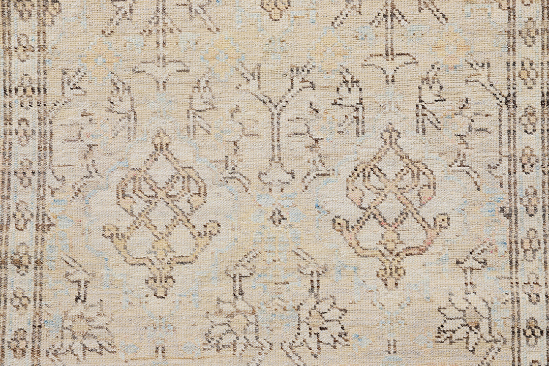 Fine hand-knotted Ariana transitional European design wool runner rug in rich camel, blue, brown, and terracotta tones