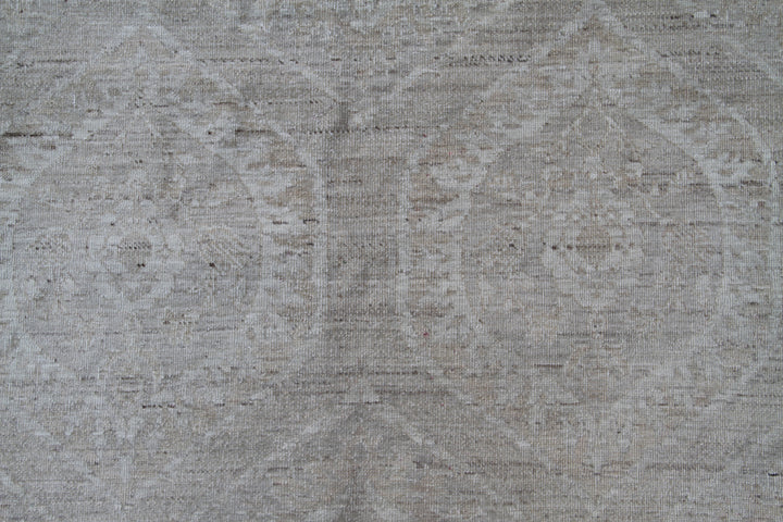 Hand-knotted 6x8 small European design wool rug in soft transitional tones